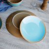 Light Brown and Blue Stoneware Plates and Bowls and Mugs